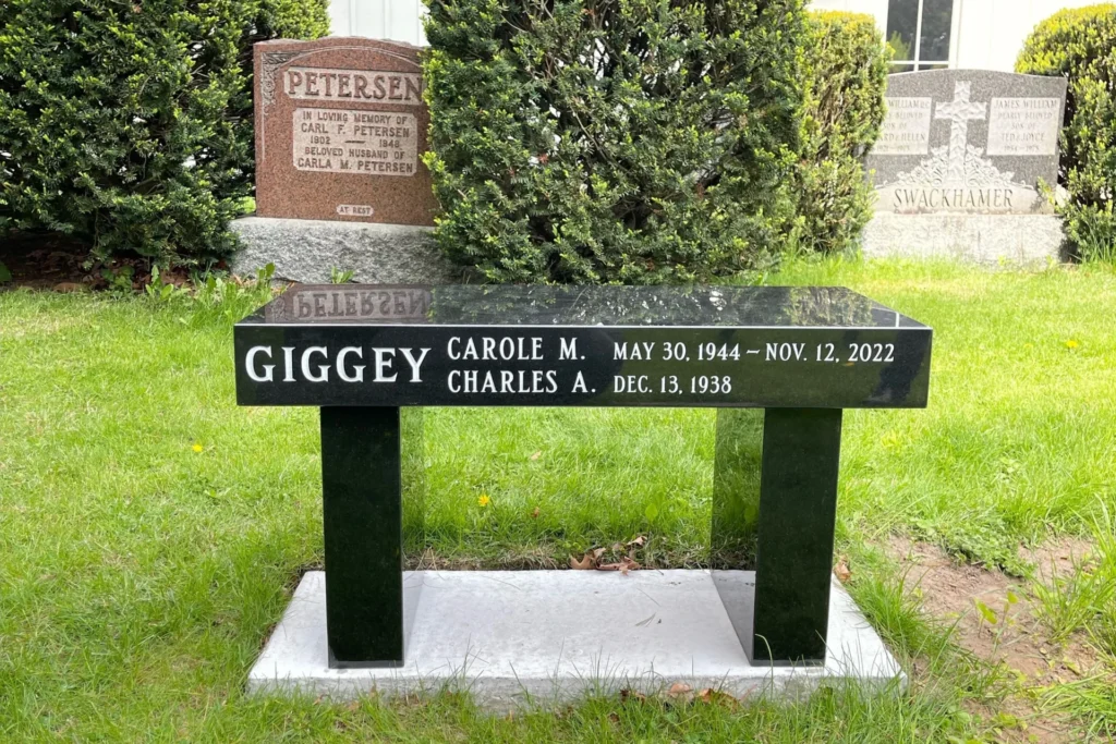 Black granite memorial bench