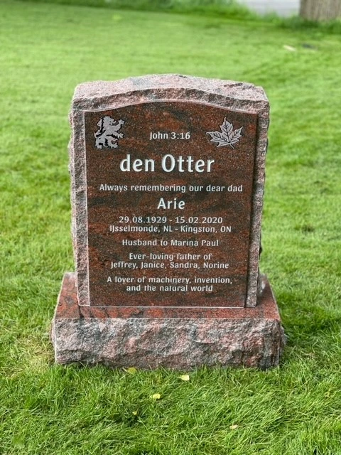 Small red granite headstone